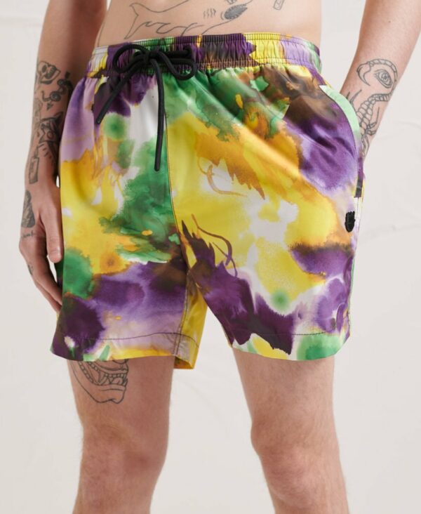 Make a splash in style with the Energy All Over Print Swim Shorts.