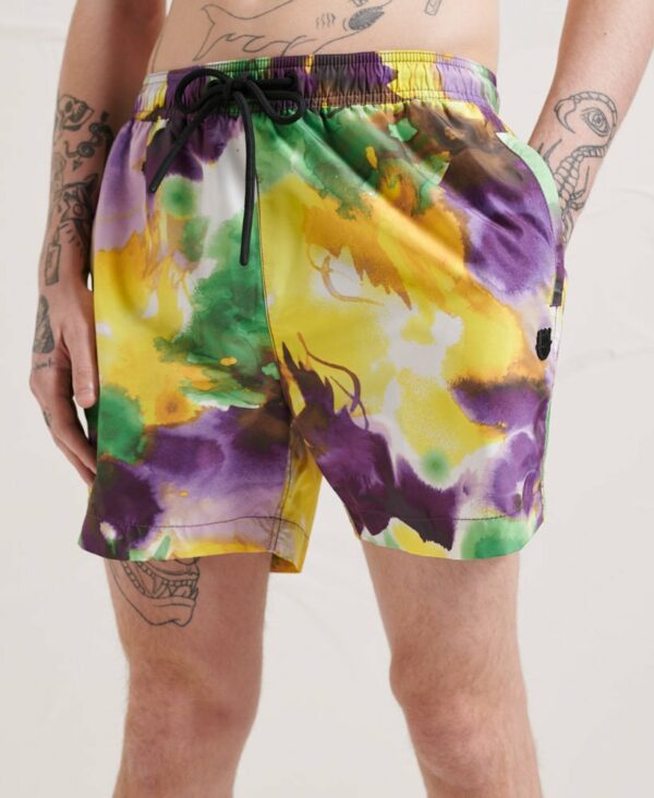 Make a splash in style with the Energy All Over Print Swim Shorts.