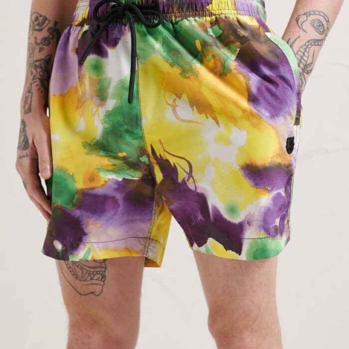 Make a splash in style with the Energy All Over Print Swim Shorts.