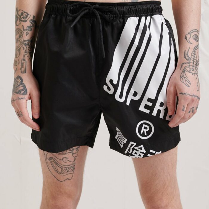 Stand out poolside this season with the Energy graphic Swim Shorts. Featuring a drawstring waist